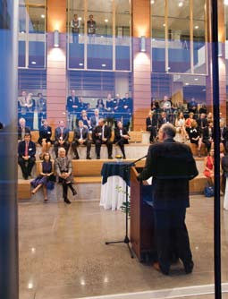 David Saunders addresses guests in the Goodes Commons during a 'sneak preview' of the new wing.